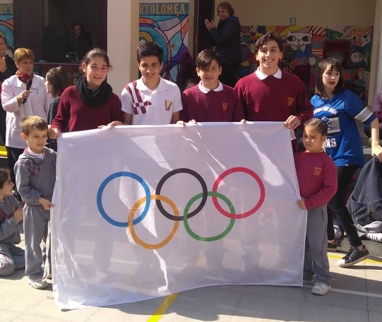 Recibimos la bandera olímpica